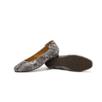 A pair of women's ballet flats featuring a gray and black snakeskin pattern, shown from the side and bottom on a white background.