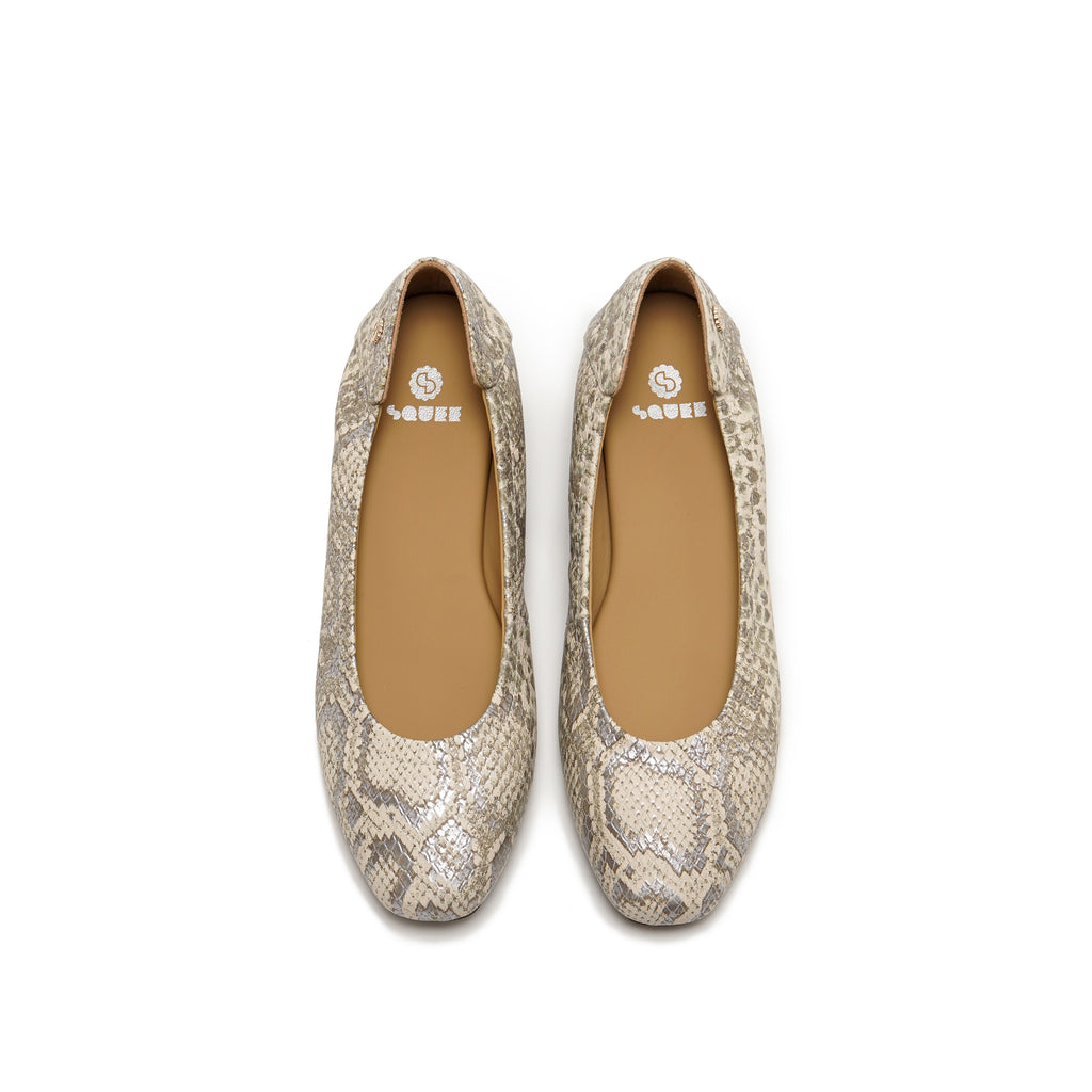 A pair of women's ballet flats with a beige and brown snakeskin pattern, shown from a top-down view on a white background.