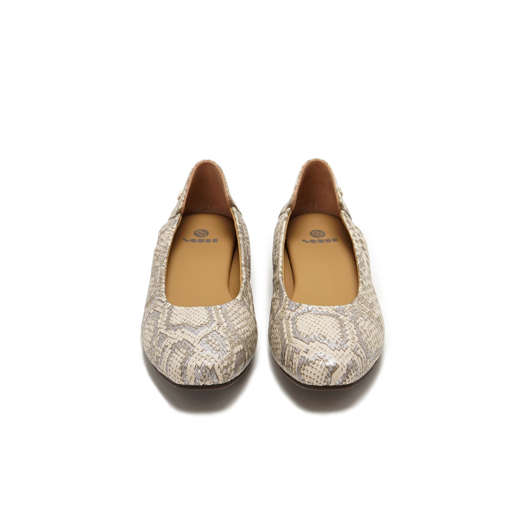 A pair of Mary Jane flats featuring a beige and gray snakeskin pattern, shown from a top-down view on a white background.